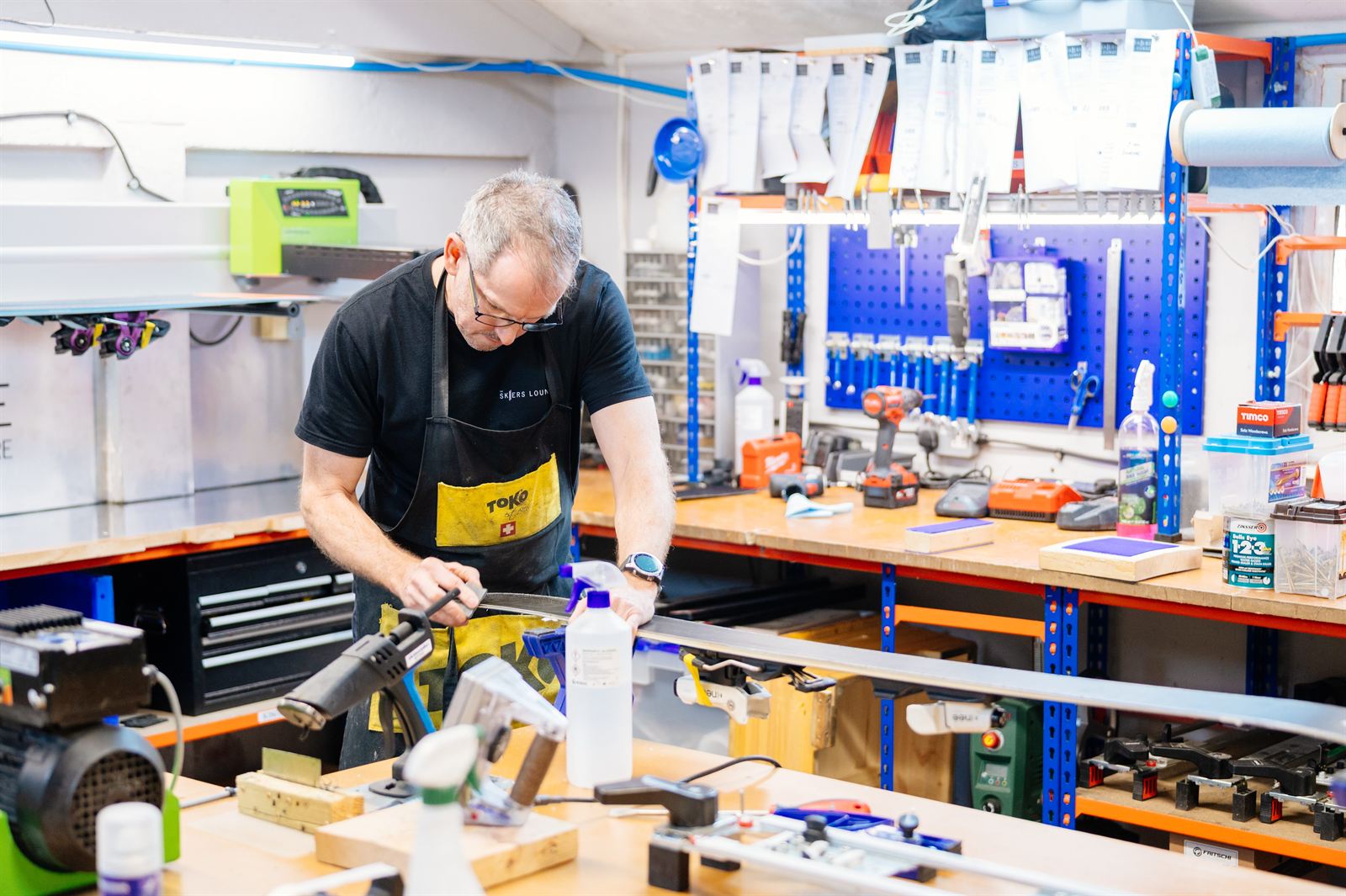 Dave at the servicing bench in The Skiers Lounge workshop